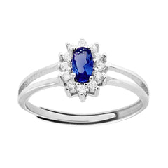 Anello Solitario con Zircone Ovale Blu Zaffiro contornato con Zirconi Bianchi